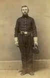 Unidentified Artilleryman conn standing with hat in hand.jpg (26589 bytes)