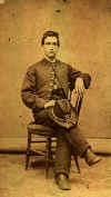 Unidentified Artilleryman seated with slouch hat on knee.jpg (58730 bytes)